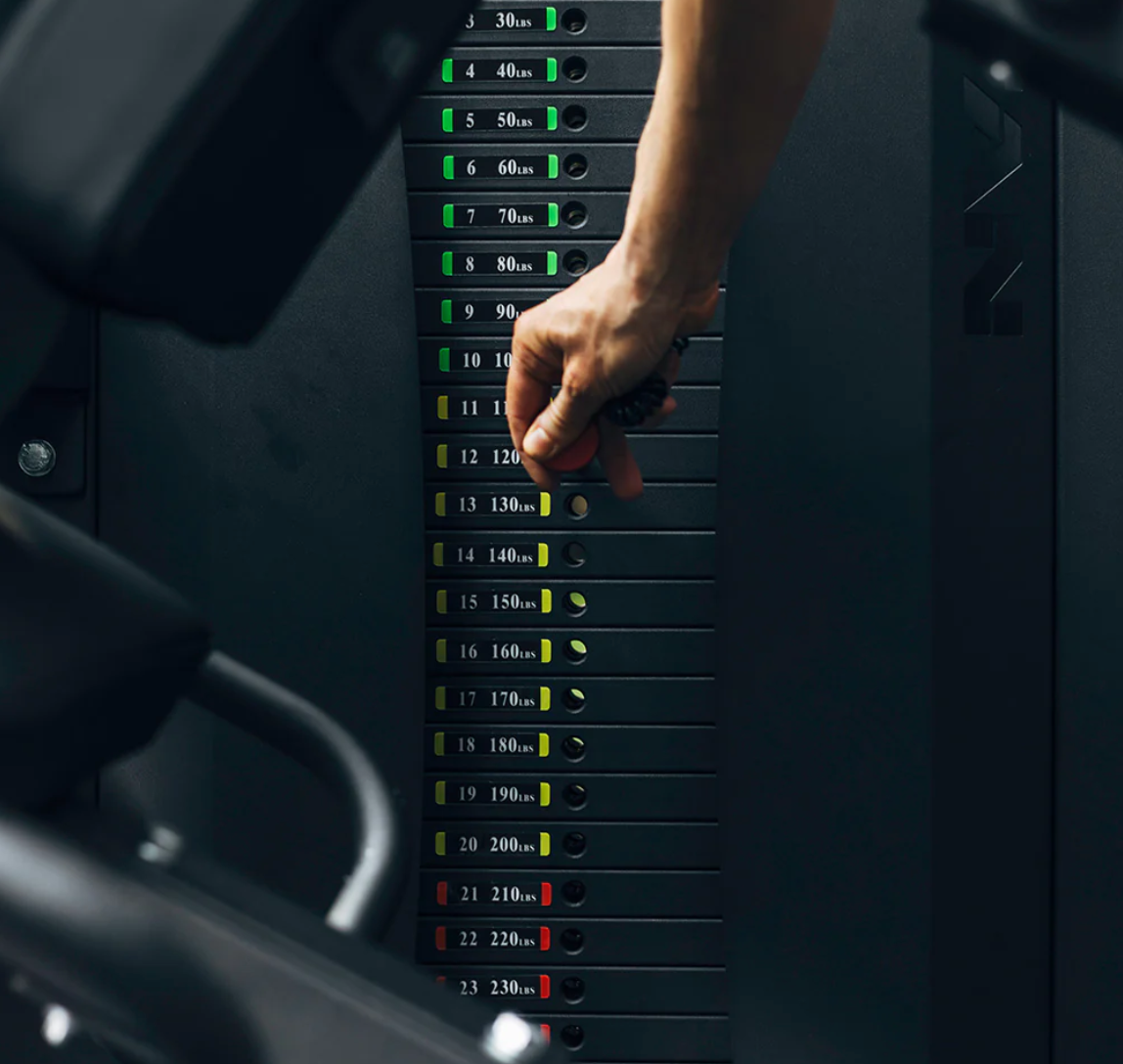 Titan Selectorized Leg Extension and Curl Machine