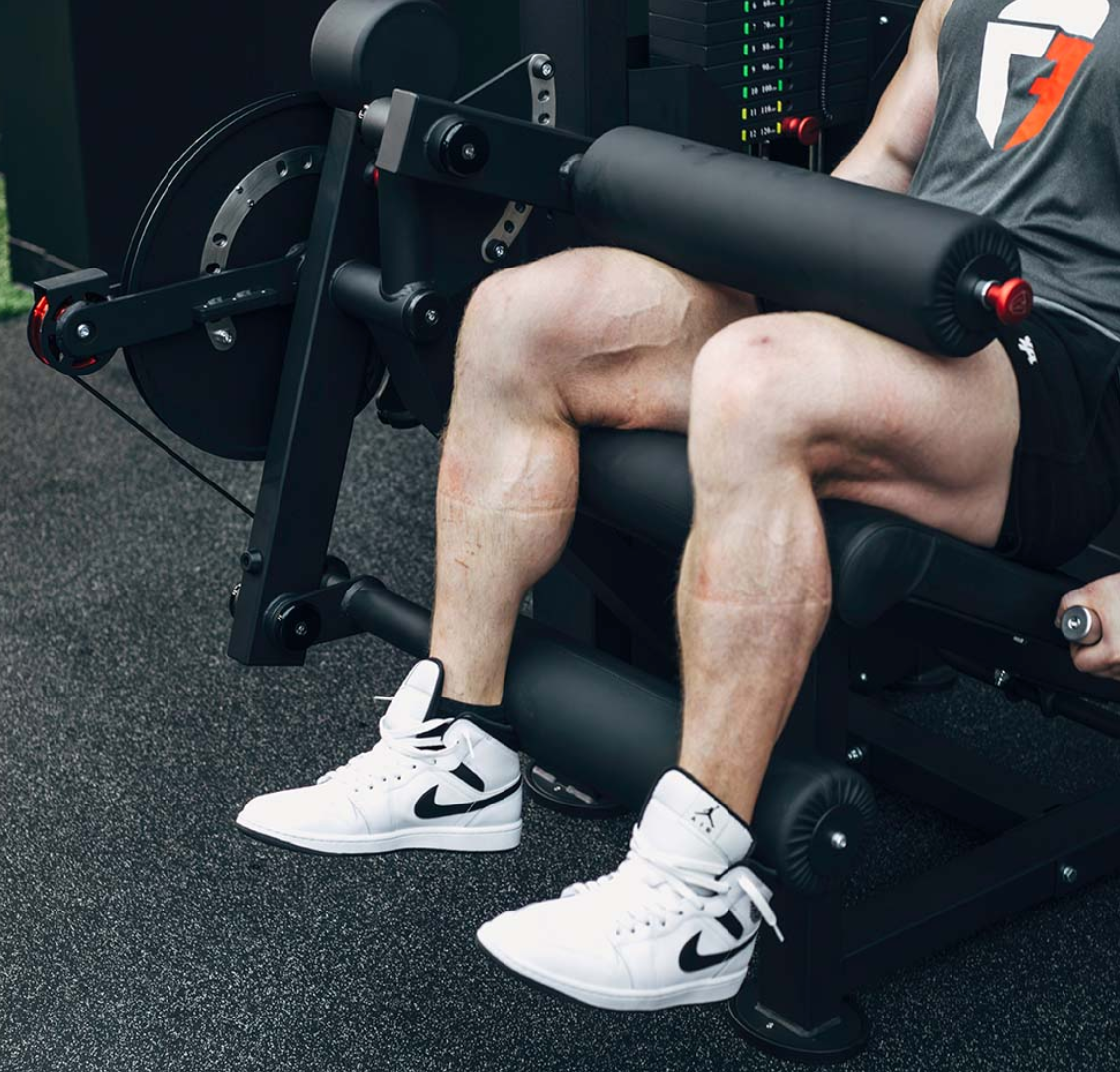 Titan Selectorized Leg Extension and Curl Machine